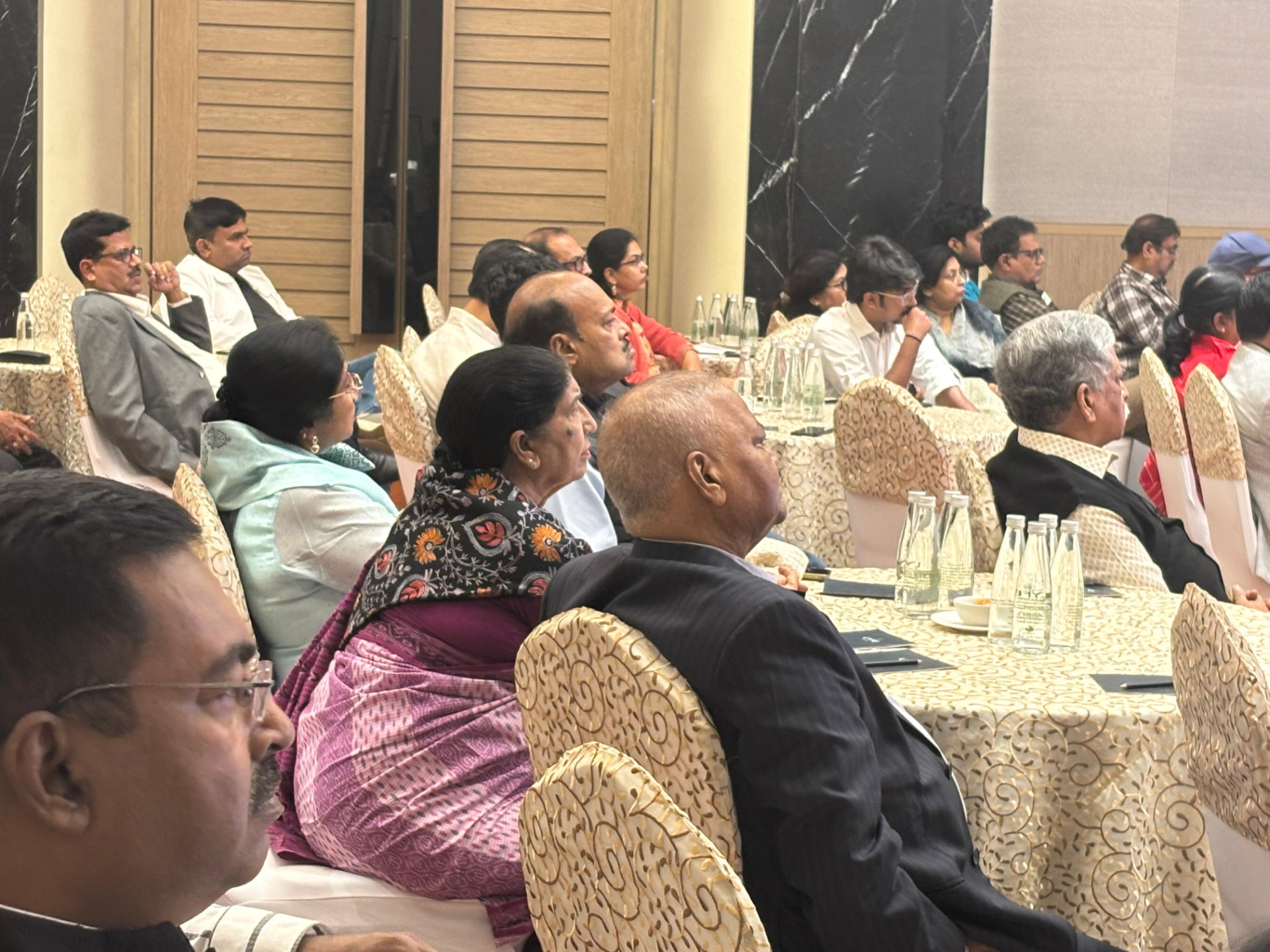 Clients listening to a session at UDAAN 2025